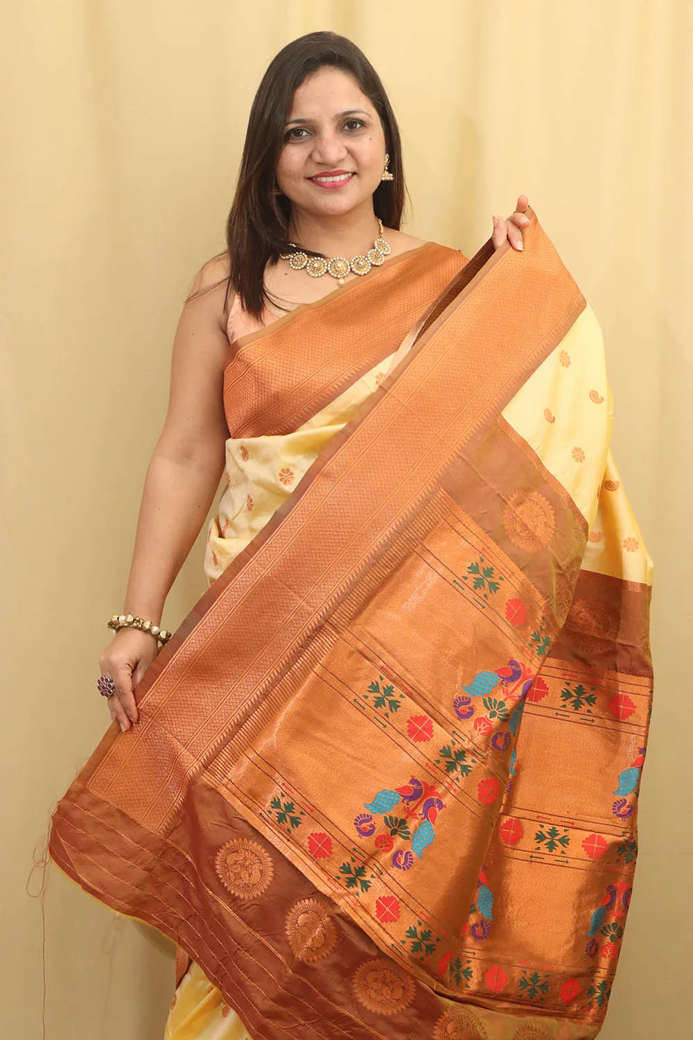 Exquisite Cream Paithani Silk Maharani Saree