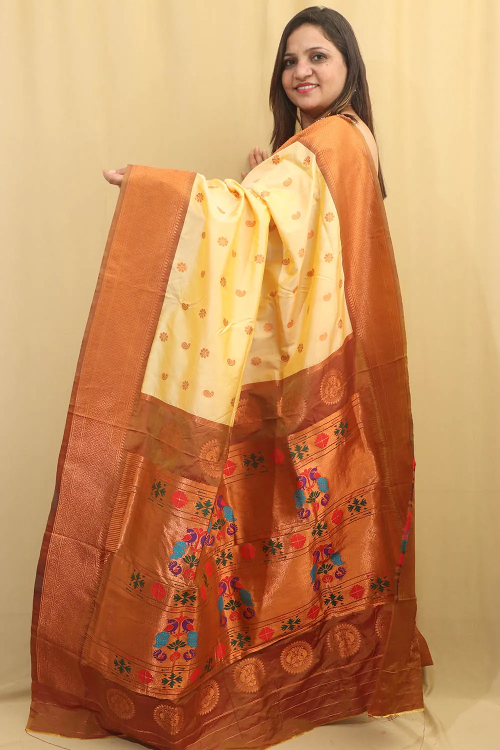 Exquisite Cream Paithani Silk Maharani Saree