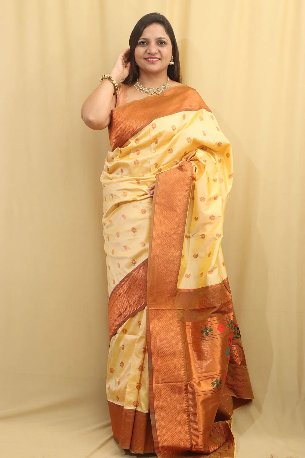 Exquisite Cream Paithani Silk Maharani Saree