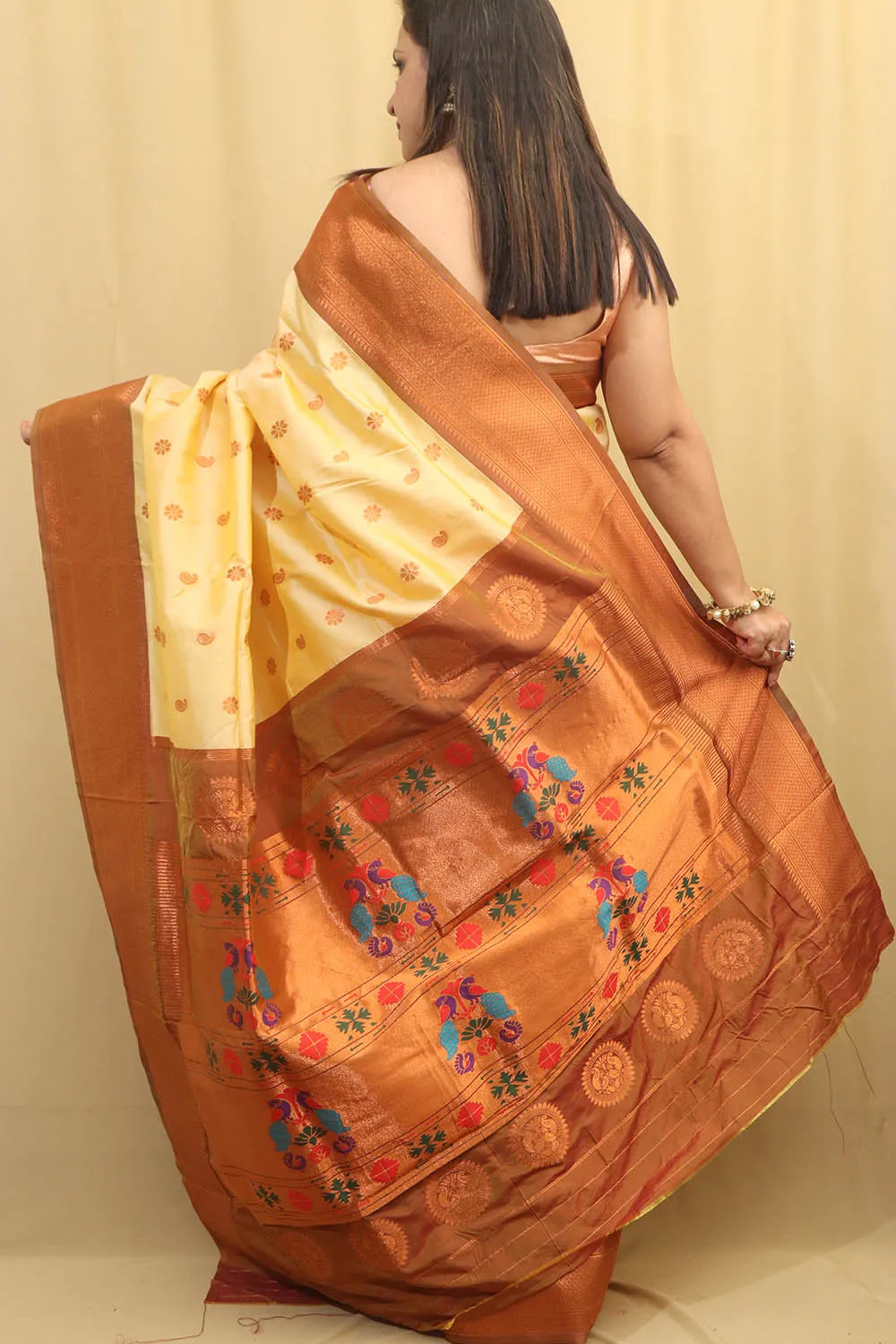 Exquisite Cream Paithani Silk Maharani Saree