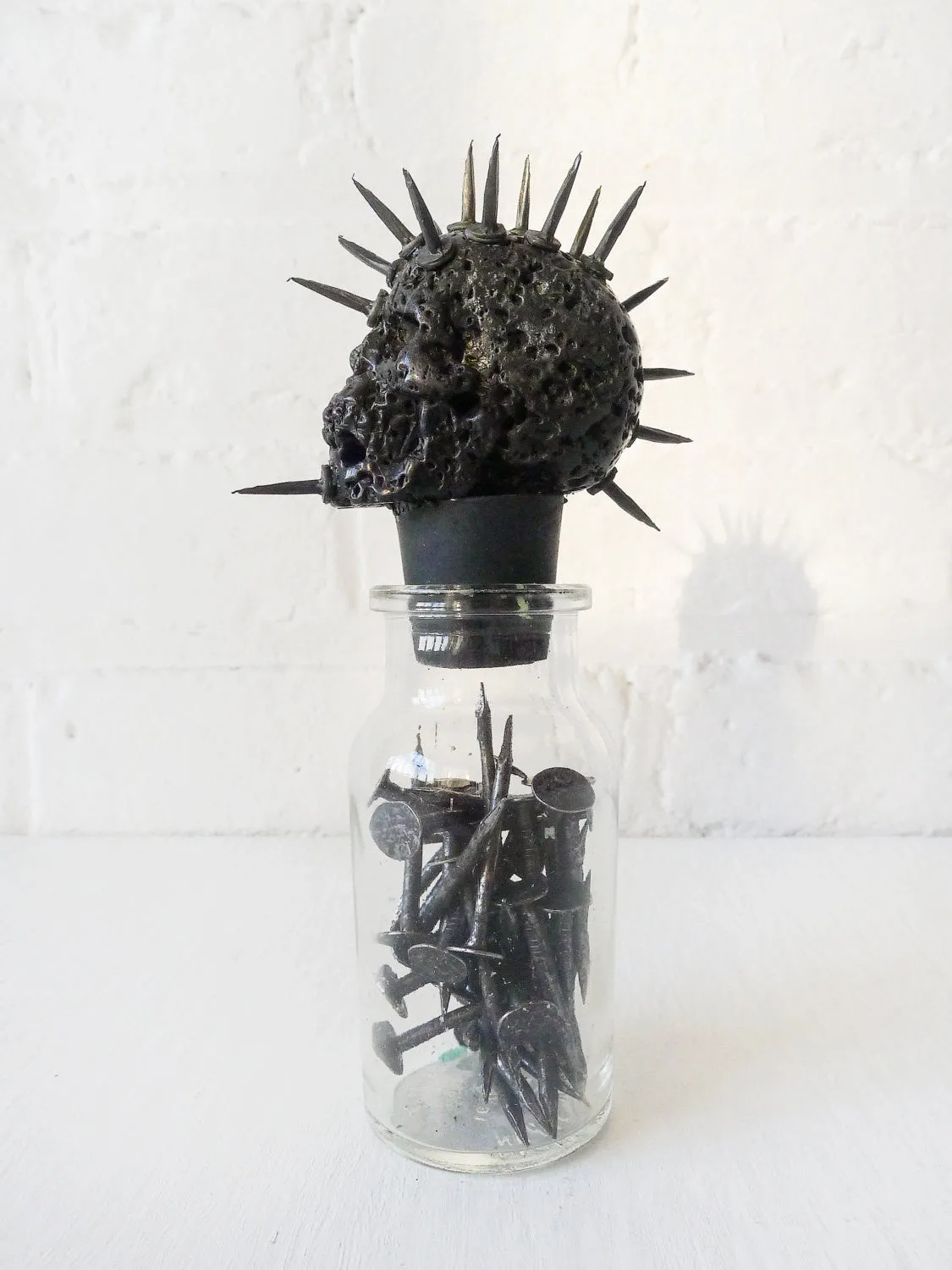 Hell Raiser Spiked Lava Skull Vintage Glass Bottle of Nails